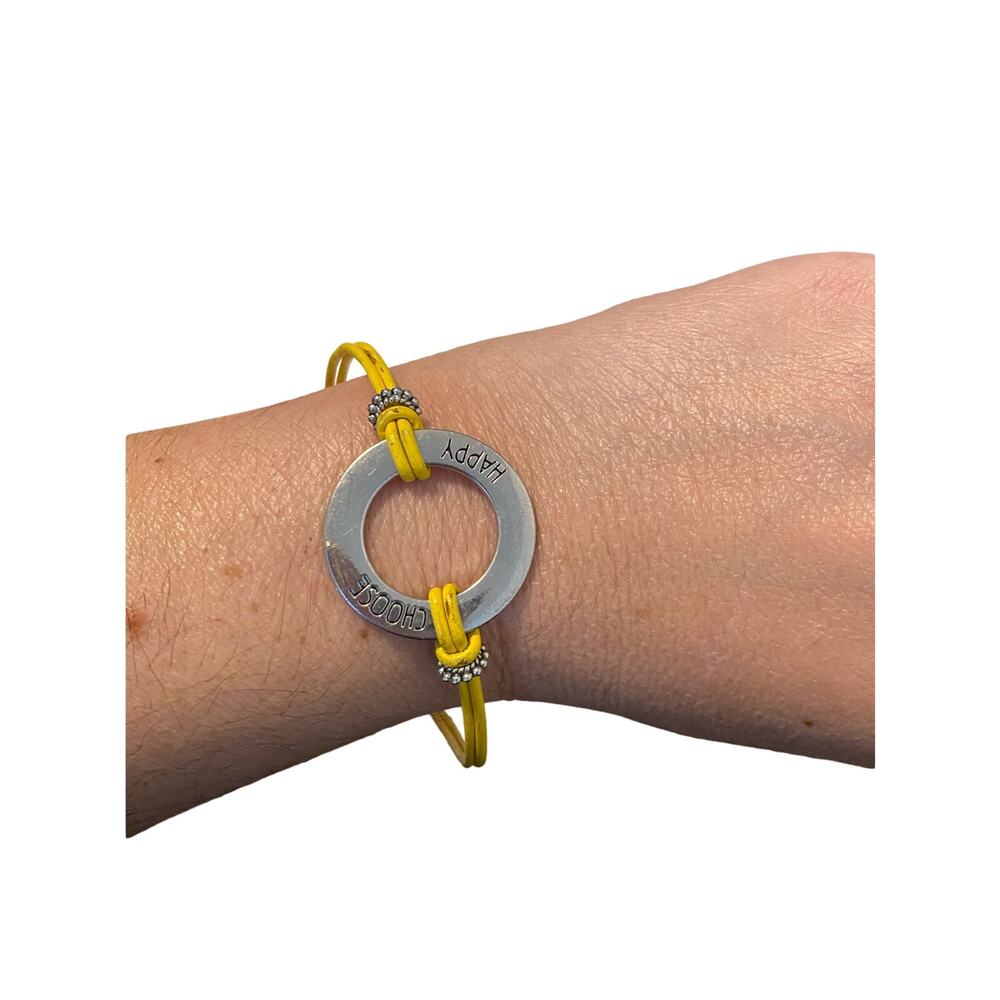 yellow cord bracelet with happy charm